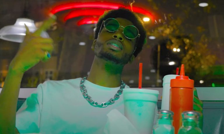 Kye Colors Sees Green In New “Posse On Broadway” Music Video